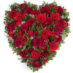 Heart in mixed flowers 