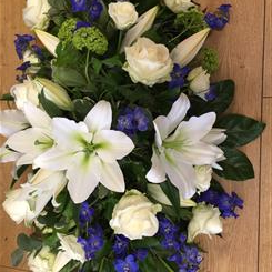 Lily and rose casket spray 