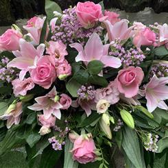 Pink rose  and lily casket spray 